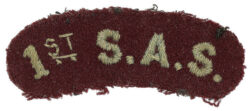 1st SAS cloth shoulder title belonging to Fred Casey. This example achieved a hammer price of £660. Photo courtesy of Bosleys Auctioneers WW2 SAS Fred Casey 'L' Detachment Special Air Service