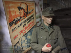 Dutch volunteer of the Panzer-Grenadier-Regiment 10 'Westland' / SS-Standarte 'Westland' and propaganda recruiting poster. Photo: Julian Tennant