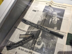 Two Dutch SS cufftitles. The "Frw. Legion Nederland" title was worn by members of the “Freiwillige Legion Niederlande” and the "Landstorm Nederland" was originally a a home guard unit, which the SS took over in 1943 and became the SS-Freiwilligen-Brigade Landstorm Nederland before evolving into the 34. SS-Freiwilligen-Grenadier-Division Landstorm Nederland in February 1945. I am not sure of the significance of the newspaper beneath the cuff titles. Photo: Julian Tennant