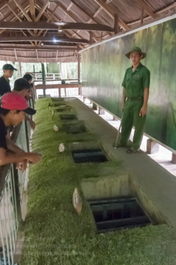 Located about 50km from Ho Chi Minh City, the tunnels at Ben Dinh are one of two such attractions (the other a little further down Provincial Road 15, at Ben Duoc) in the Cu Chi district. Entrance fee is 65000 Dong which includes a guided tour starting in a partially dug in classroom where the guide provides an overview of the tunnel system and its role in the conflict. From there you are shown various exhibits including booby trap and protection measures, command bunkers, hospitals and a munitions manufacturing workshop that recycled unexploded American ordnance. Some, such as the one demonstrating how the infamous ‘Ho Chi Minh sandals’ were made from old tyres allow the visitor to see how the items were made as well as buy the manufactured product. A 50m section of tunnel has been recreated for (larger ‘western’) visitors who wish to experience the feeling of crawling in the dark, dank confines a few meters below the surface. Scattered throughout the site are a handful of war artifacts including a knocked out M-41 tank, munitions and signposts indicating bomb craters, which may otherwise remain unnoticed amongst the rejuvenated undergrowth. At one end there is a café area and 25m shooting range where you can let loose with the usual assortment of M16’s, AK 47’s, M-60’s etc or add some more fake Zippo lighters, dog tags, beer can toys and ‘ho chi minh sandals’ to your collection. For more information go to www.cuchitunnel.org.vn