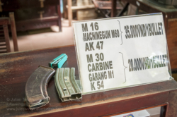 Located about 50km from Ho Chi Minh City, the tunnels at Ben Dinh are one of two such attractions (the other a little further down Provincial Road 15, at Ben Duoc) in the Cu Chi district. Entrance fee is 65000 Dong which includes a guided tour starting in a partially dug in classroom where the guide provides an overview of the tunnel system and its role in the conflict. From there you are shown various exhibits including booby trap and protection measures, command bunkers, hospitals and a munitions manufacturing workshop that recycled unexploded American ordnance. Some, such as the one demonstrating how the infamous ‘Ho Chi Minh sandals’ were made from old tyres allow the visitor to see how the items were made as well as buy the manufactured product. A 50m section of tunnel has been recreated for (larger ‘western’) visitors who wish to experience the feeling of crawling in the dark, dank confines a few meters below the surface. Scattered throughout the site are a handful of war artifacts including a knocked out M-41 tank, munitions and signposts indicating bomb craters, which may otherwise remain unnoticed amongst the rejuvenated undergrowth. At one end there is a café area and 25m shooting range where you can let loose with the usual assortment of M16’s, AK 47’s, M-60’s etc or add some more fake Zippo lighters, dog tags, beer can toys and ‘ho chi minh sandals’ to your collection. For more information go to www.cuchitunnel.org.vn