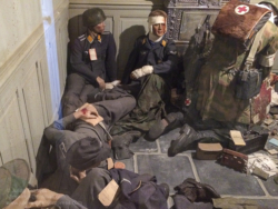Fallschirmjäger Regiment 6 first aid station exhibit detail. Photo: Julian Tennant 'Dead Man’s Corner' - German Paratrooper Museum – Saint-Côme-du-Mont, Normandy