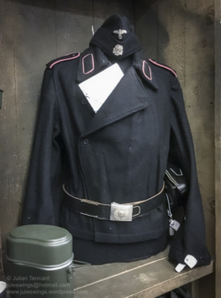 Reproduction uniform for sale in the 'Paratrooper' shop at the Dead Man's Corner Museum. Photo: Julian Tennant 'Dead Man’s Corner' - German Paratrooper Museum – Saint-Côme-du-Mont, Normandy