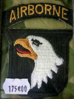 US 101st Airborne patch for sale in the 'Paratrooper' shop. Photo: Julian Tennant 'Dead Man’s Corner' - German Paratrooper Museum – Saint-Côme-du-Mont, Normandy
