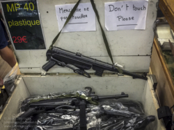 Plastic German MP 40's for sale in the 'Paratrooper' shop at the Dead Man's Corner Museum. Photo: Julian Tennant 'Dead Man’s Corner' - German Paratrooper Museum – Saint-Côme-du-Mont, Normandy