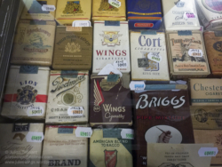 WW2 period cigarettes for sale in the 'Paratrooper' shop at the Dead Man's Corner Museum. Photo: Julian Tennant 'Dead Man’s Corner' - German Paratrooper Museum – Saint-Côme-du-Mont, Normandy