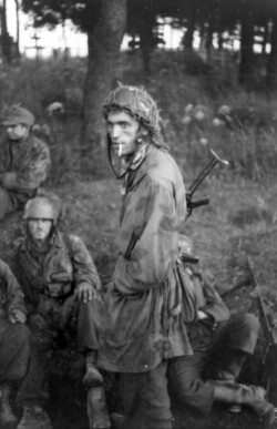 Fallschirmjäger resting in Normandy. June 1944. Photo: Slickers. Bundesarchiv Accession Number: Bild 101I-586-2225-11A 'Dead Man’s Corner' - German Paratrooper Museum – Saint-Côme-du-Mont, Normandy
