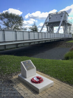 Pegasus Bridge and memorial plaque to Lieutenant H.D. Brotheridge who was the first British soldier to be killed in action on D-Day when he led his platoon across the bridge. Photo: Julian Tennant