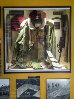 Objects relating to the Royal Ulster Rifles. The Dennison smock was worn on D-Day and during the Battle of Normandy by Captain Bob Sheridan, Adjutant of the 1st Battalion Royal Ulster Rifles. Photo: Julian Tennant