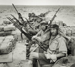 A heavily-armed patrol of 'L' Detachment SAS in their jeeps, wearing 'Arab-style' headdress, January 1943. Imperial War Museum Object No. 205196152 sas north africa 1 SAS