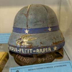 Model Rold 1918 pilot helmet used by parachuting pioneer Alfredo Ereno on the occasion of his 'world record' free fall jump opening his parachute at a height of 87m at Ponte S. Pietro (BG) in 1923.