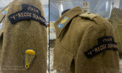 British battledress jacket worn by an Italian paratrooper of 1st Reconnaissance Squadron “F” featuring a combination of Italian paratrooper collar and qualification insignia along with a British styled shoulder title.