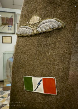 Italian Liberation Armed Forces uniform detail featuring a locally made British parachutist wing and sleeve badge of the Folgore Combat Group.