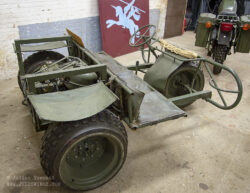 Fabrique Nationale AS 24 combat trike. Also known as the 'Véhicule Aeroporte' or 'Tricar Parachutable', this is one of 46 produced during the 1960's for service by parachute troops. Including the driver it could carry four passengers and carry a maximum cargo of 350kg and reach a top speed of 97km per hour.