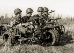 Gunned up Fabrique Nationale AS 24 Combat Tricycle.