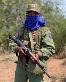 A soldier of the Myanmar National Democratic Alliance Army (MNDAA) guarding a military base in the Kokang region. March 11, 2015. Photo: REUTERS Myanmar National Democratic Alliance Army (MNDAA)