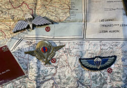 Embroidered British type parachutist wing worn by French Special Operations Executive (SOE) agents (12), an interesting 1946 pattern French parachutist brevet, numbered 7751 that has been modified to include the Free French Cross of Lorraine (13) and 1944 pattern Special Air Service parachutist badge.
