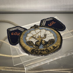 Patch and collar badges of the pre-war 602e Groupe d'Infanterie de l'Air / 602nd Parachute Infantry Group (GIA) which was initially stationed in Algeria and dissolved in August 1940. Musée Mémorial des Parachutistes