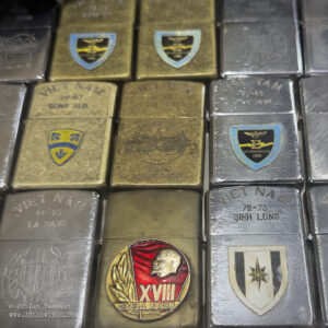 Dan Sinh War Surplus Market. March 2026. FAKE Vietnam War Zippos. Photo: Julian Tennant Dan Sinh War Surplus Market